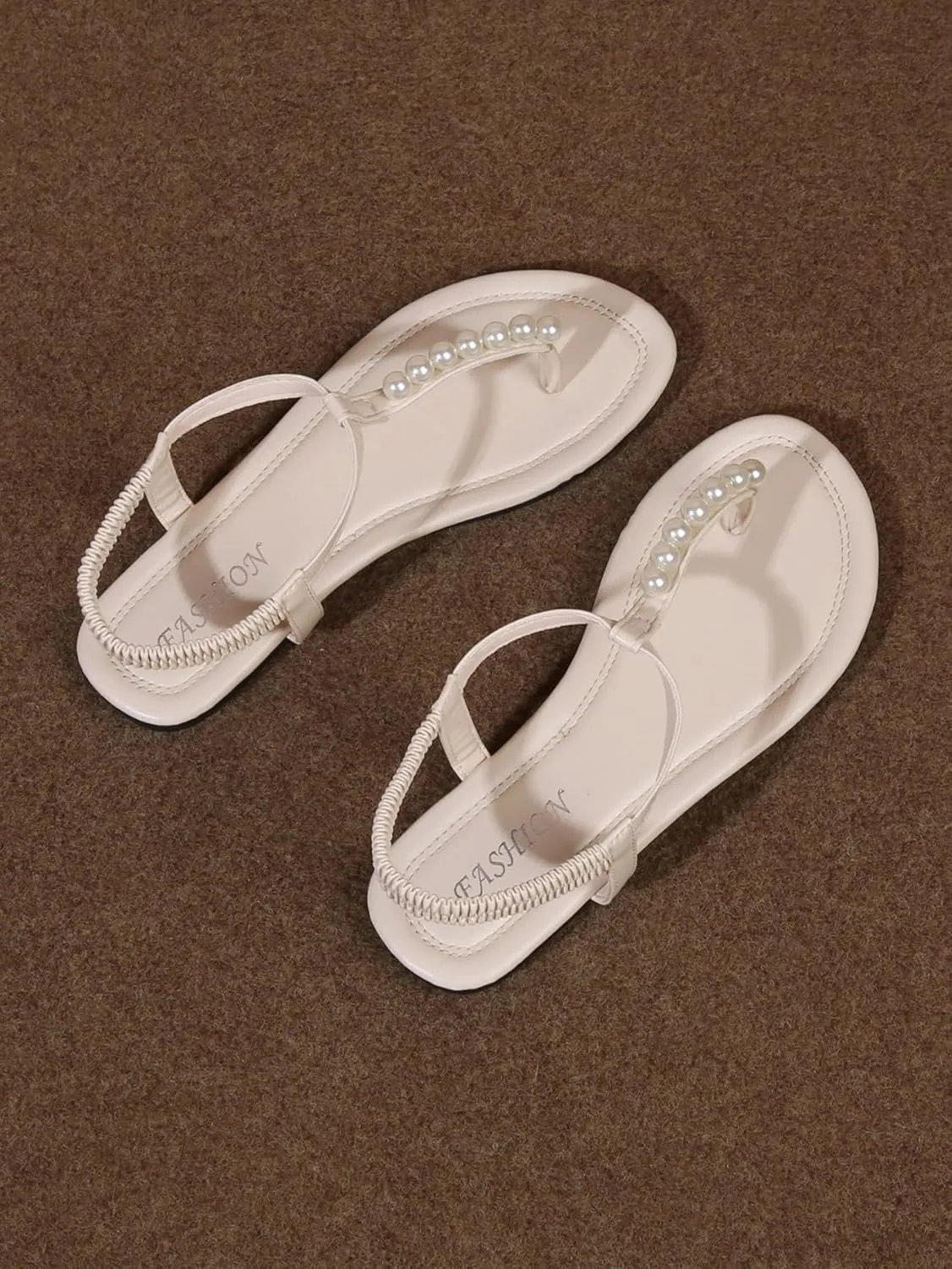 GORGLITTER Women's Bow Pearl T-Strap White Flat Sandals Summer Vacation Beach Bridal Wedding Shoes 2025
