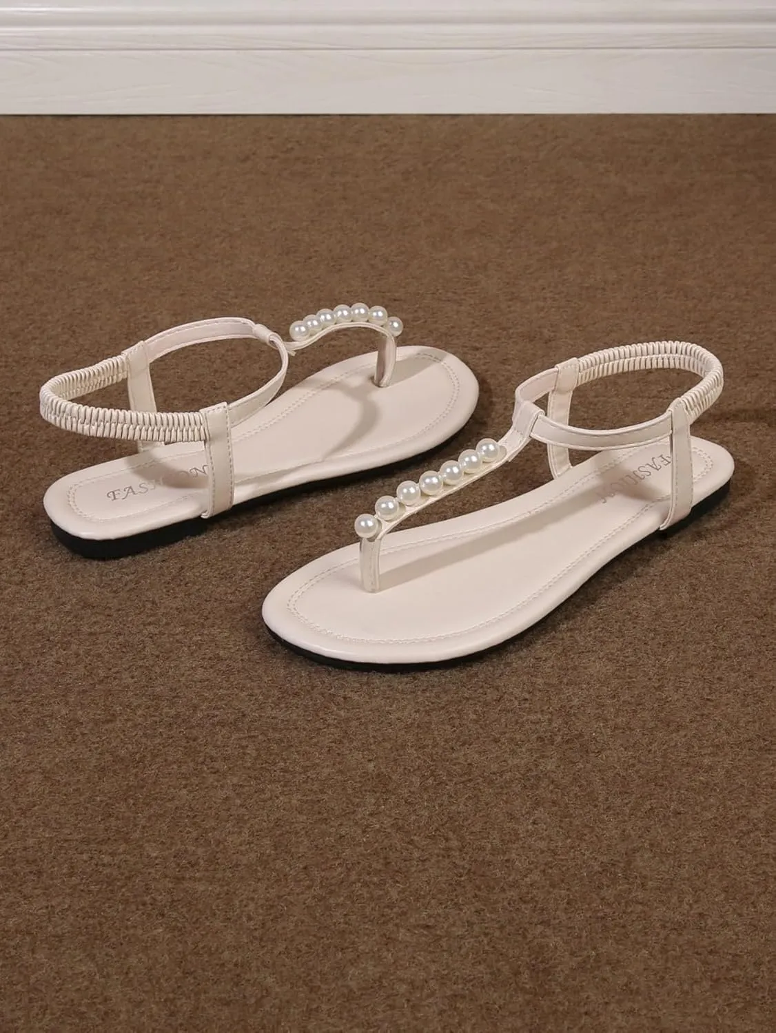 GORGLITTER Women's Bow Pearl T-Strap White Flat Sandals Summer Vacation Beach Bridal Wedding Shoes 2025