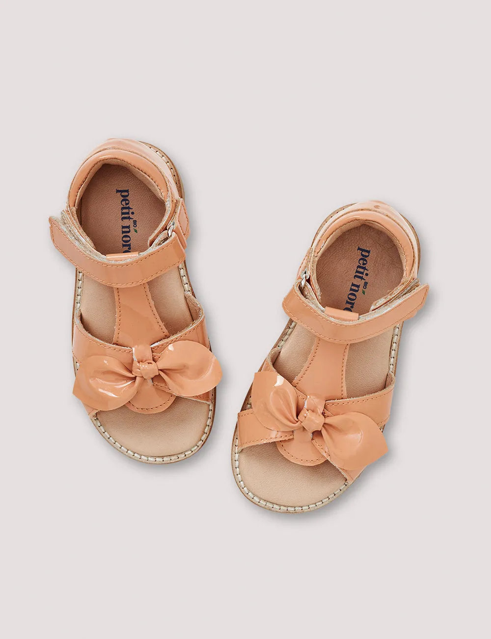 Petit Nord Apricot Patent Bow Sandal